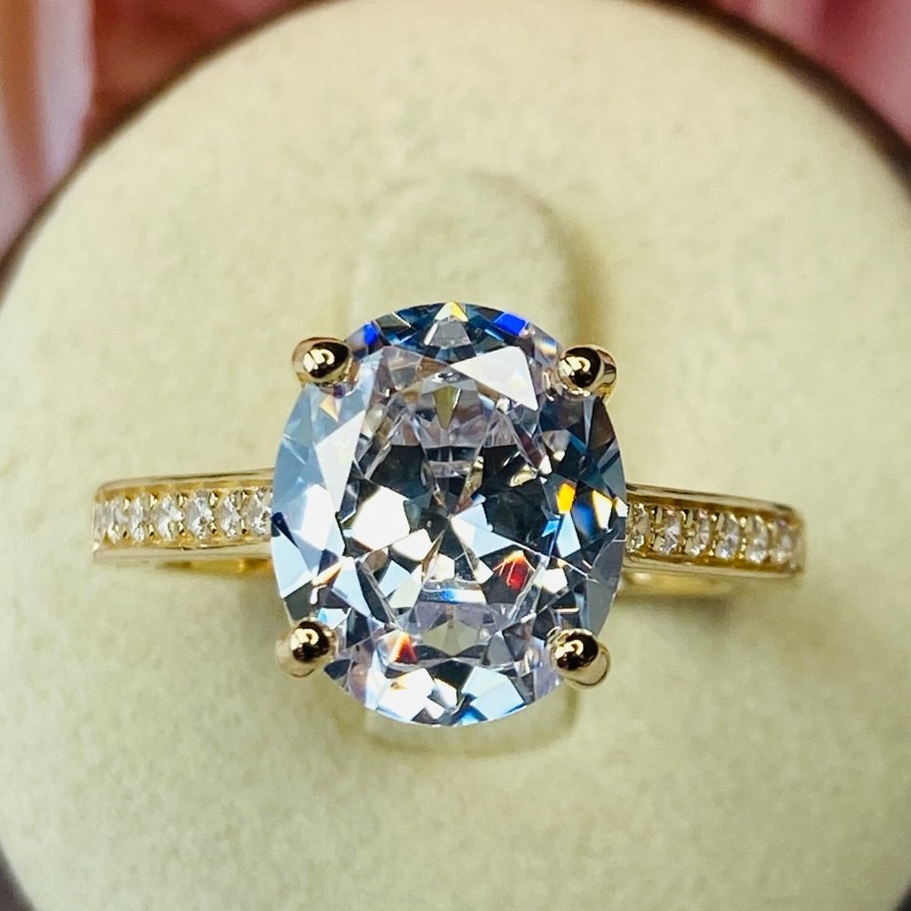 White Oval Cubic Zirconia 18k Yellow Gold Over Sterling Silver Engagemen…